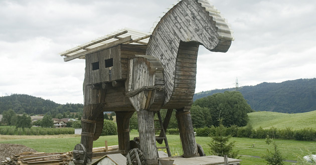 A wooden horse outdoors.