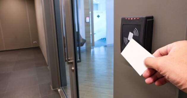 A hand reaching to use RFID key card to access to office building area and workspace